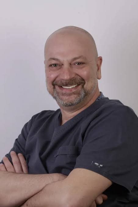Dr. Can Tokman, DDS Dr. Can Tokman, DDS
